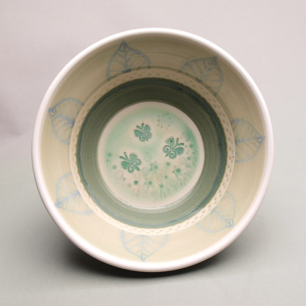 Elegant Porcelain Bowl with an ornate butterflies and flowers imprint – Handcrafted Artistry