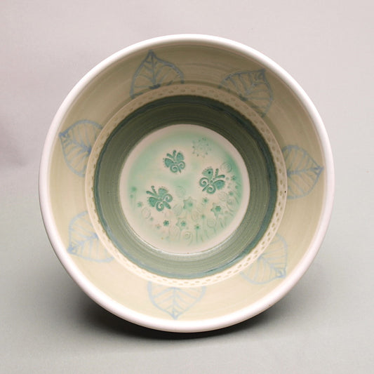 Elegant Porcelain Bowl with an ornate butterflies and flowers imprint – Handcrafted Artistry