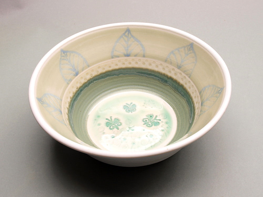 Elegant Porcelain Bowl with an ornate butterflies and flowers imprint – Handcrafted Artistry