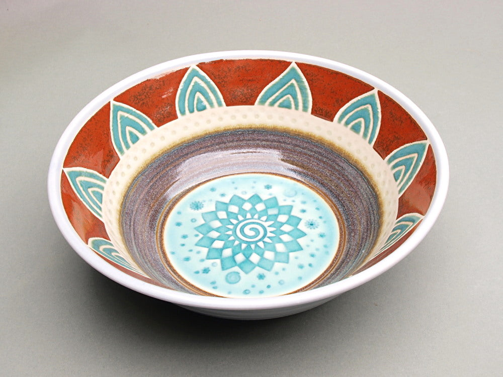 Elegant Porcelain Bowl with a pinwheel and stars imprint – Handcrafted Artistry