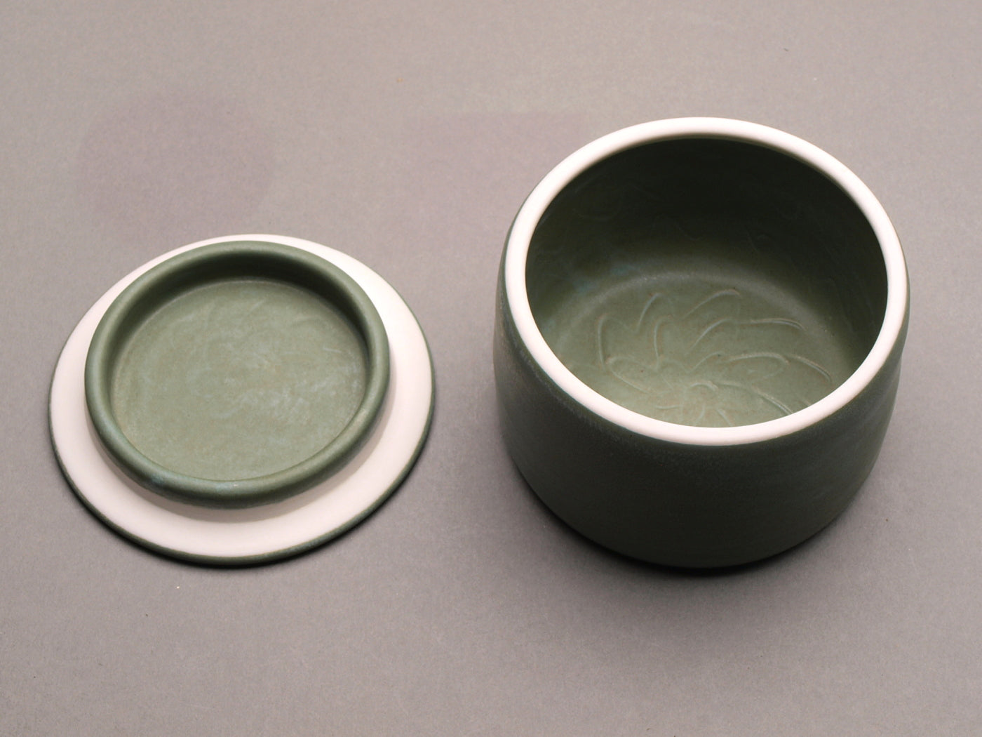 Handmade Ceramic Decorative Storage Jar with Patterned Lid. Sage Green color, Turquoise  "Whirlwind" Motif Design Top.