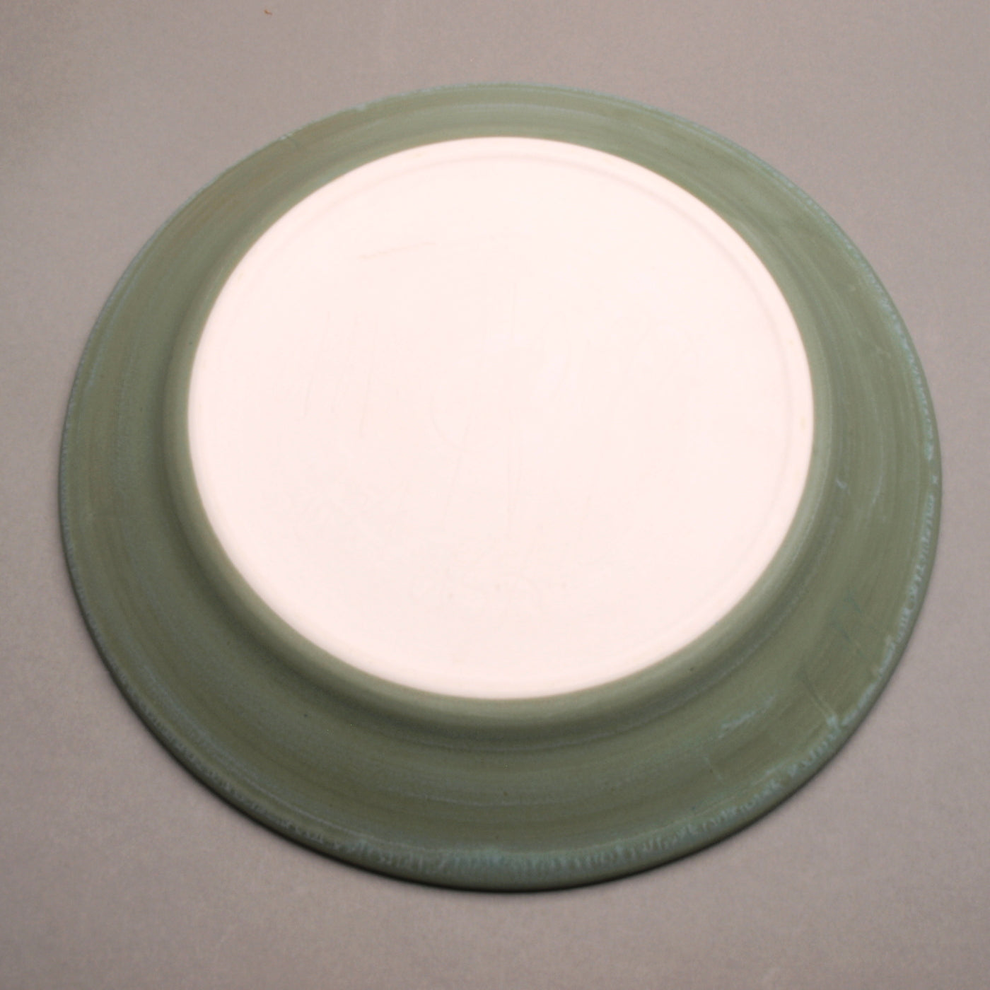 TURTLE & SWIRLING FINS PLATTER – A handcrafted porcelain centerpiece by Mike Hays, featuring intricate Southwestern-inspired design.