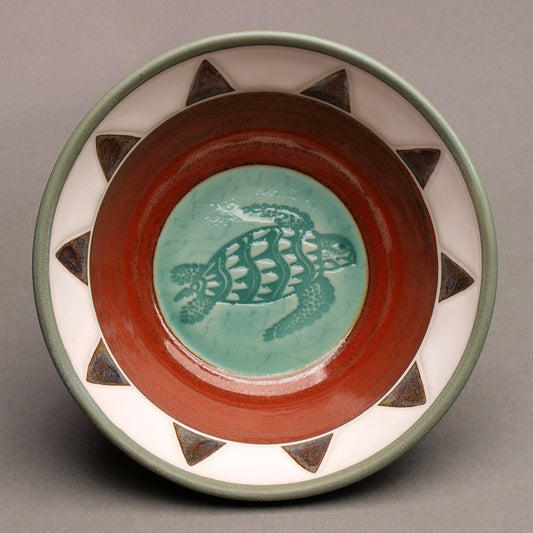 Ceramic Porcelain Pottery Handcrafted Sea Turtle Bowl, Southwestern Style Ceramic, Iron Red Ohata with Turquoise Center, Sage green exterior. Tribal Triangle Border, 8-Point Sun Design